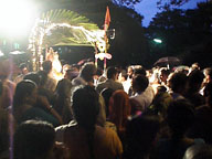Faithful surround Lord Ganesh.